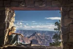 Girl looking at Grand Canyon