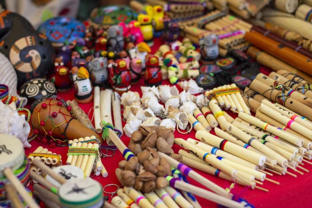 Colorful Peruvian artisanal crafts and Andean musical instruments