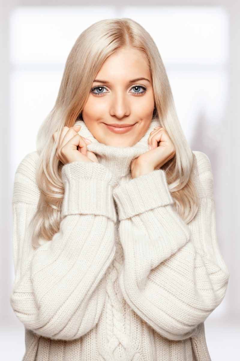 Blonde Woman in genuine Cashmere Sweater