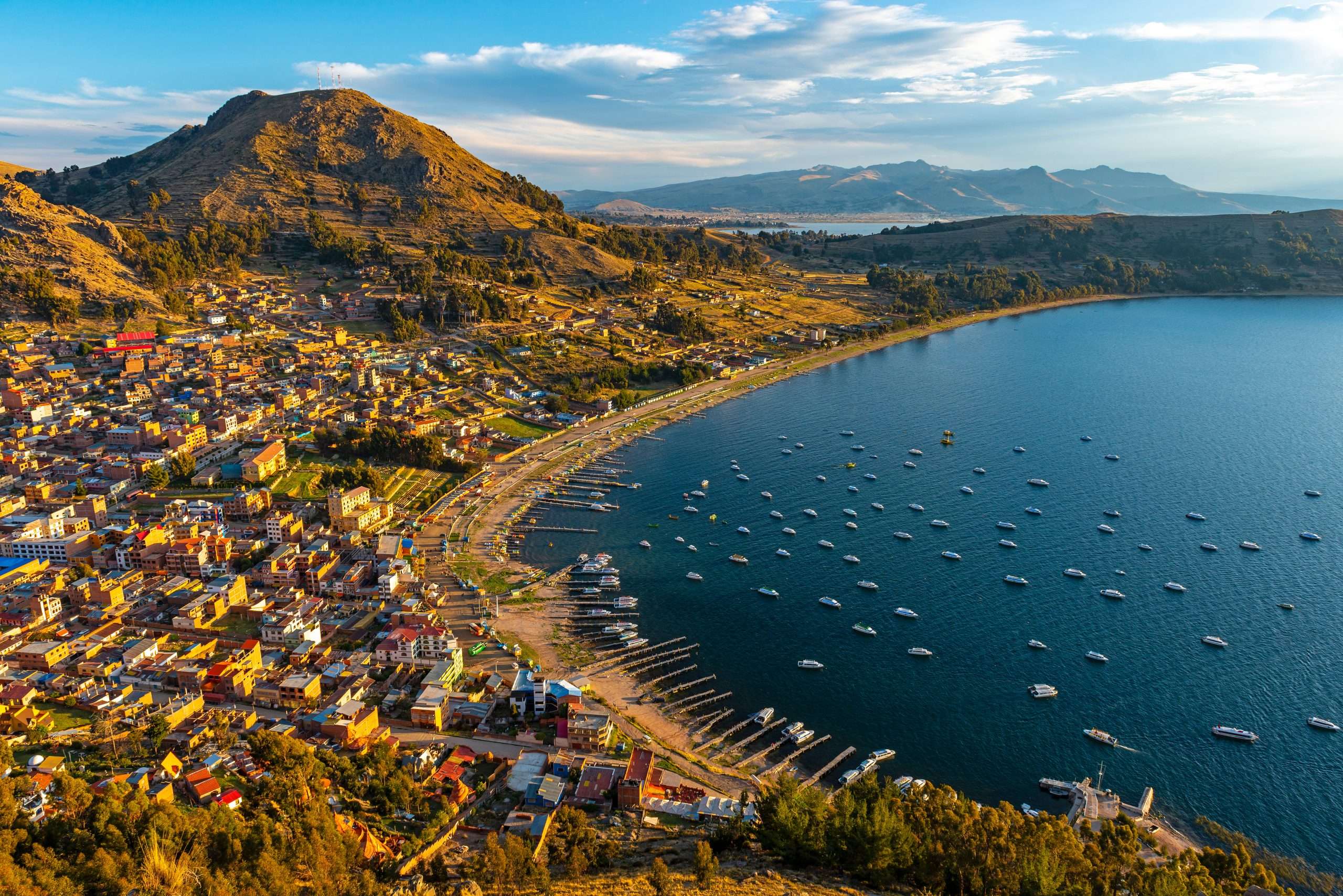 Cityscape of Copacabana city and the Titicaca Lake at sunset, Bolivia.