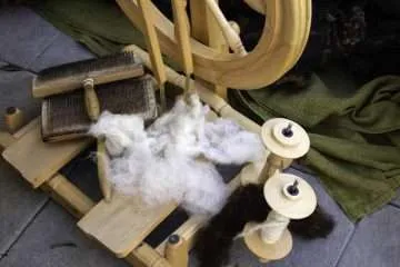 Spinning wool on spinning wheel